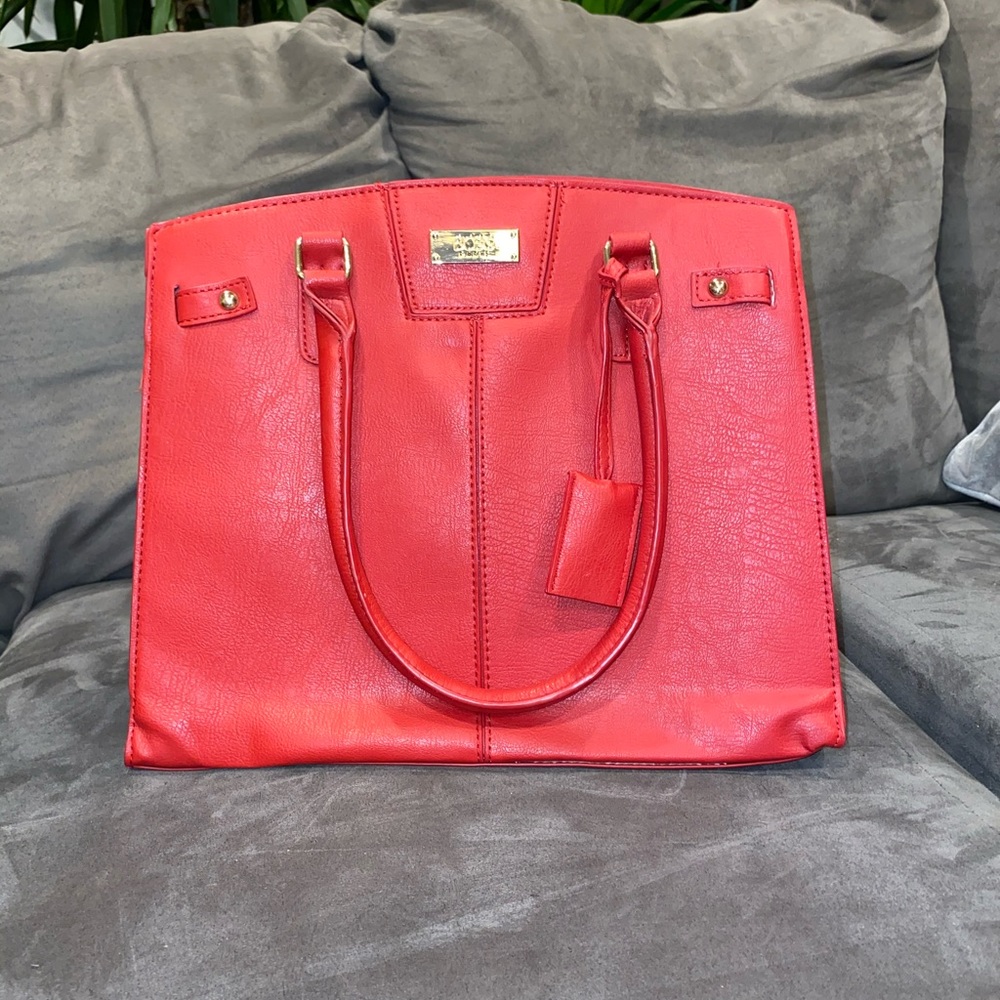 BCBG Paris red bag with gold details